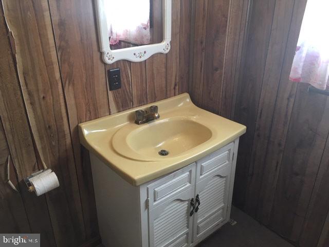 435 St Johns Road Littlestown, PA 17340 - Photo 22 of 25 a bathroom with a sink and mirror