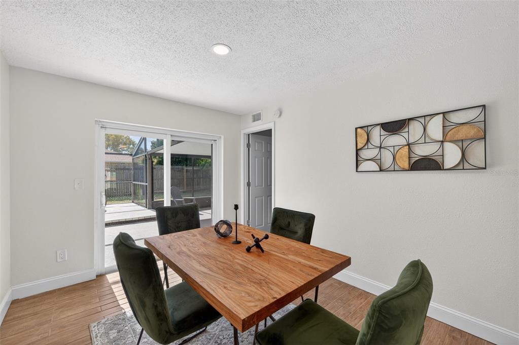 3733 Coppertree Circle Brandon, FL 33511 - Photo 12 of 45 a view of a workspace with furniture and a potted plant