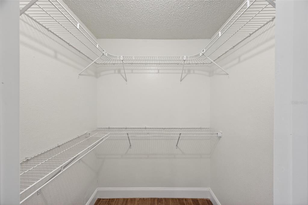 3733 Coppertree Circle Brandon, FL 33511 - Photo 18 of 45 a view of a room with racks on the wall