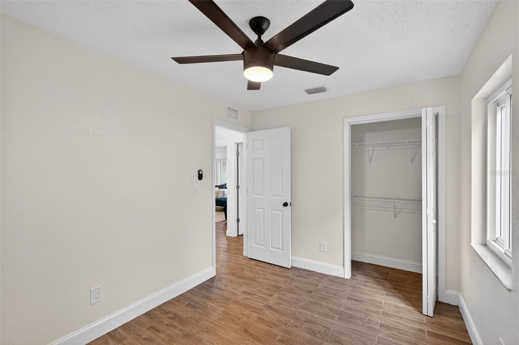 3733 Coppertree Circle Brandon, FL 33511 - Photo 27 of 45 a view of empty room with wooden floor