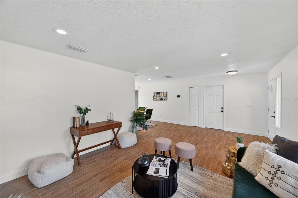 3733 Coppertree Circle Brandon, FL 33511 - Photo 3 of 45 a living room with furniture and wooden floor