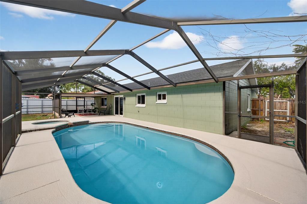 3733 Coppertree Circle Brandon, FL 33511 - Photo 32 of 45 a view of a swimming pool with a patio