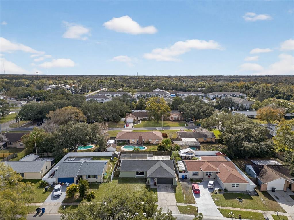 3733 Coppertree Circle Brandon, FL 33511 - Photo 42 of 45 an aerial view of residential houses with outdoor space