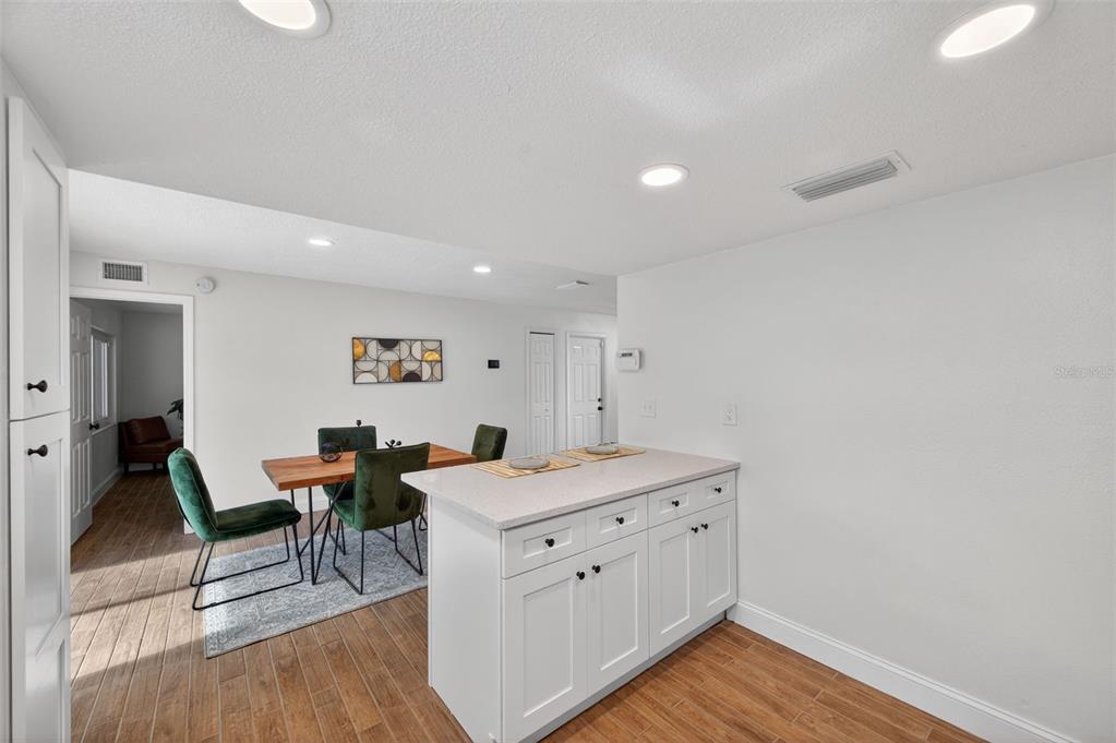 3733 Coppertree Circle Brandon, FL 33511 - Photo 9 of 45 a view of a room with wooden floor lounge chair and windows