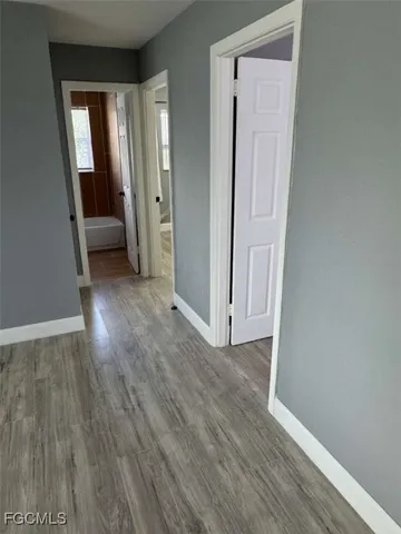 an entryway at livingroom with furniture and wooden floor