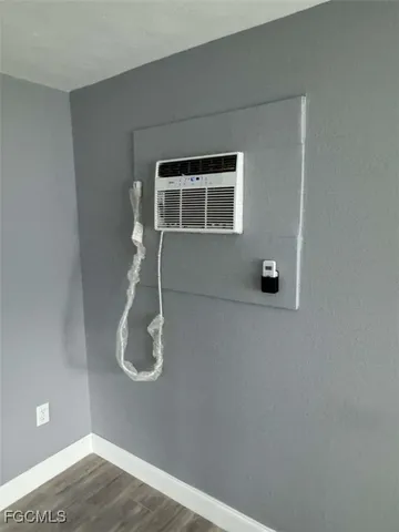 a view of a livingroom with wooden floor