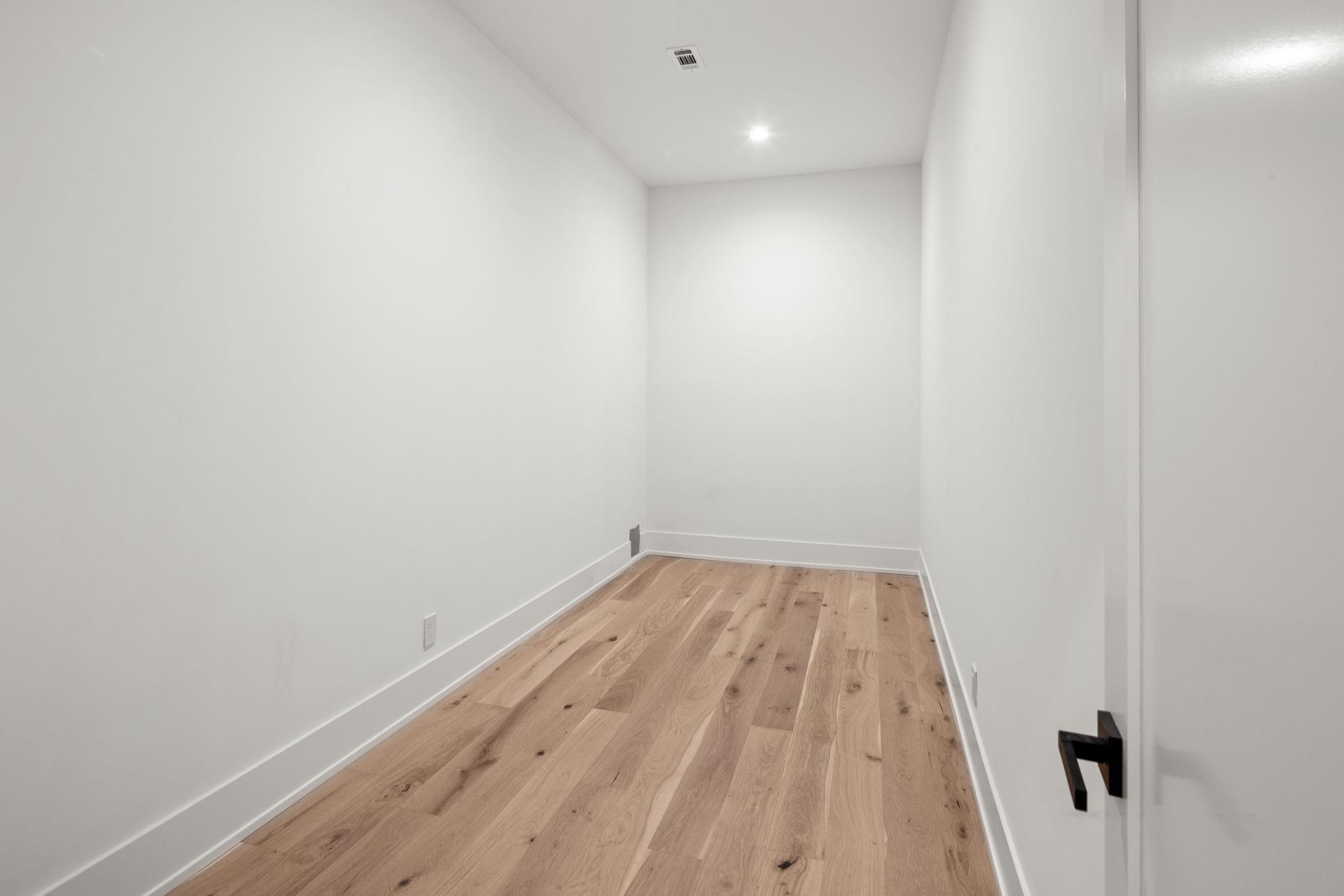 583 Comanche Ridge Round Mountain, TX 78663 - Photo 19 of 30 a view of small space with wooden floor