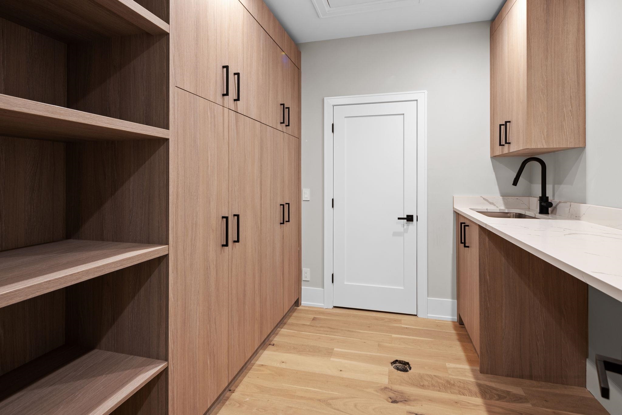 583 Comanche Ridge Round Mountain, TX 78663 - Photo 24 of 30 a view of a kitchen from the hallway