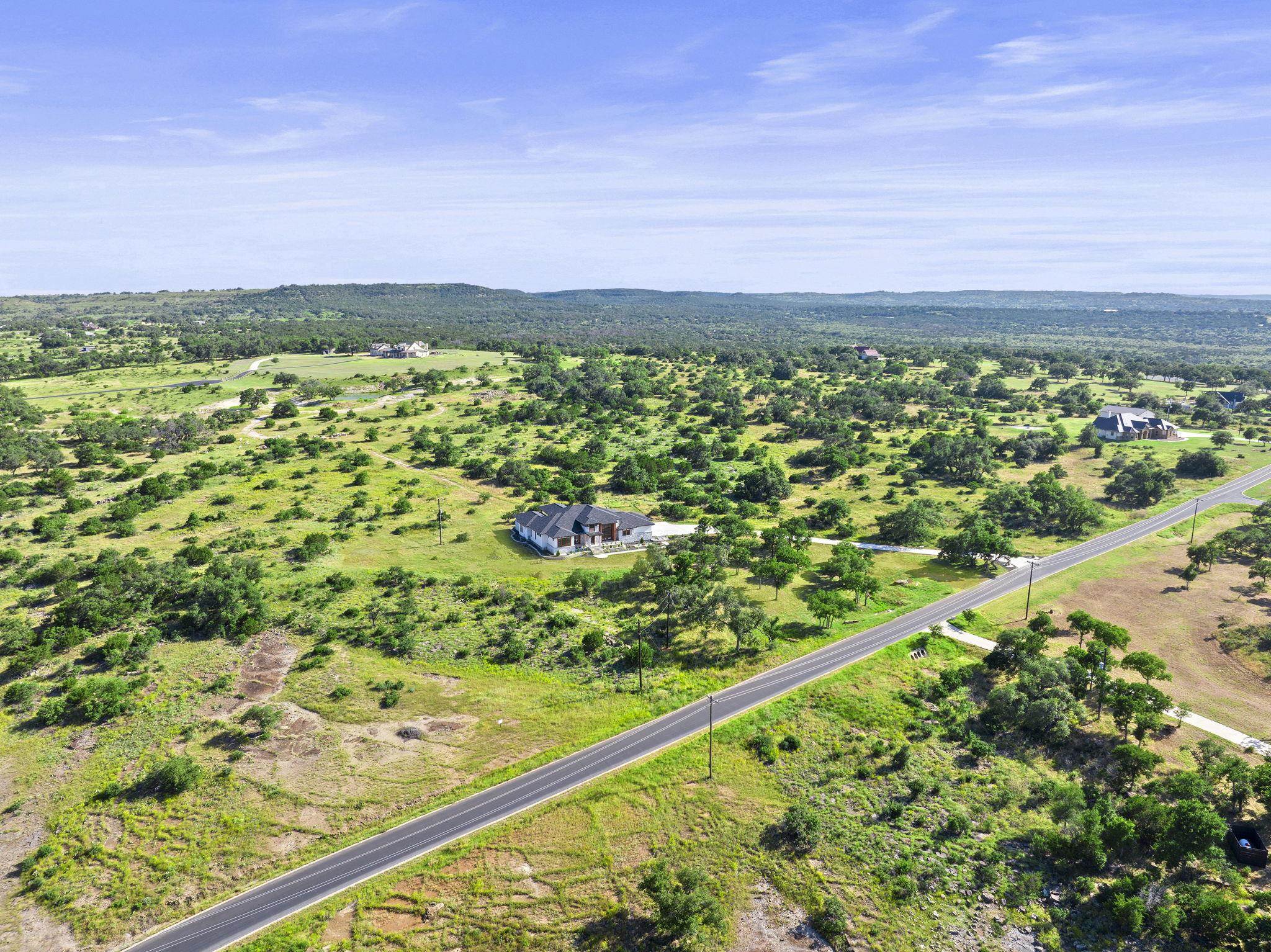 583 Comanche Ridge Round Mountain, TX 78663 - Photo 28 of 30 a view of a green field