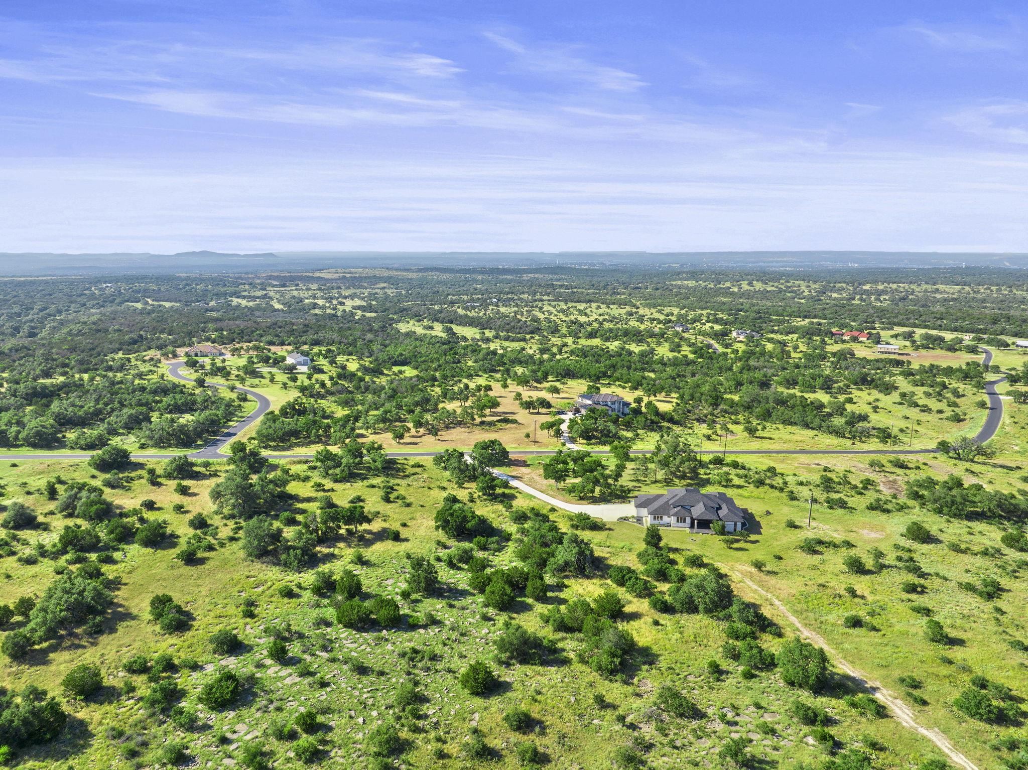 583 Comanche Ridge Round Mountain, TX 78663 - Photo 29 of 30 a view of a green field