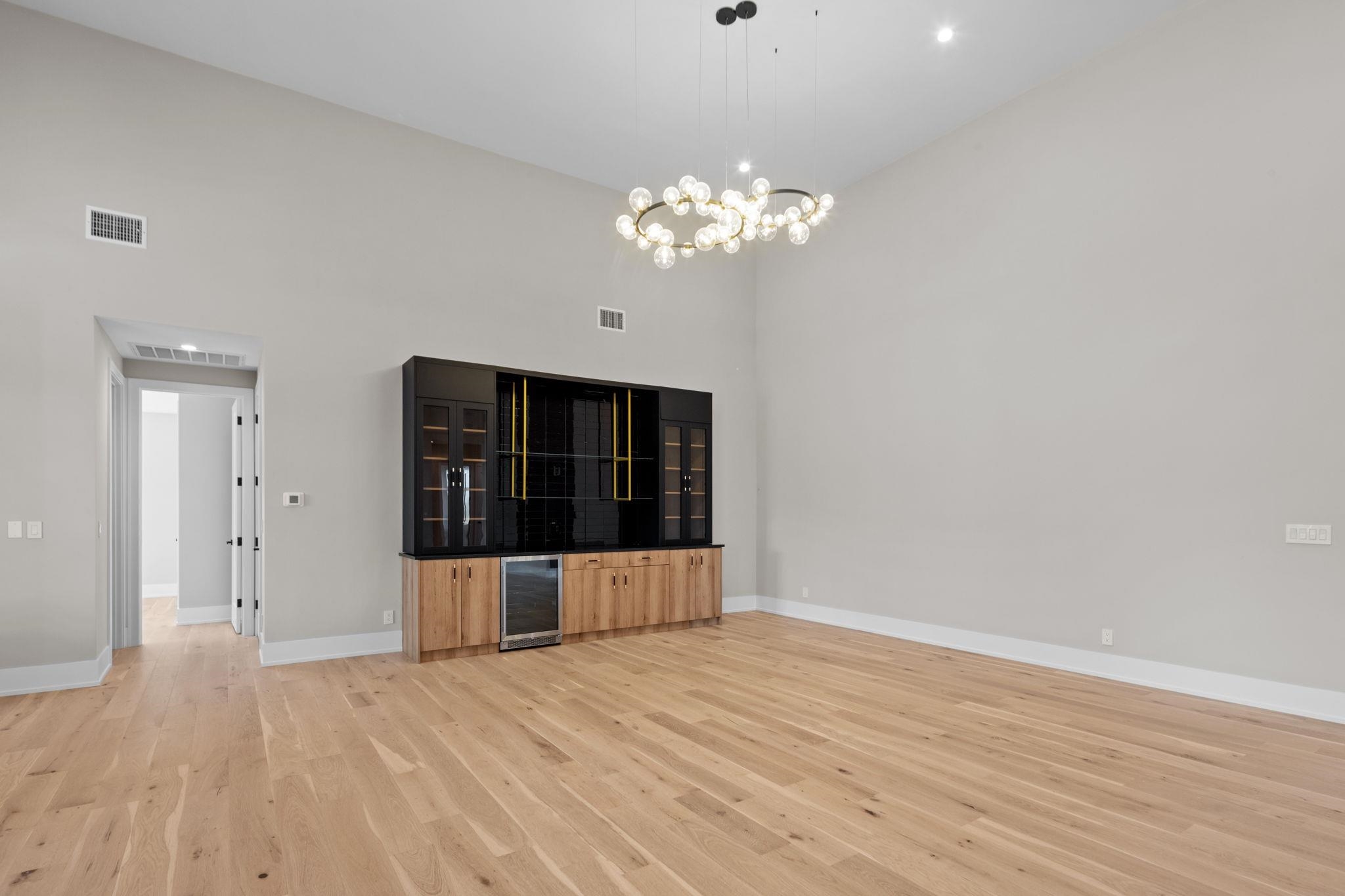 583 Comanche Ridge Round Mountain, TX 78663 - Photo 10 of 30 a view of empty room with wooden floor