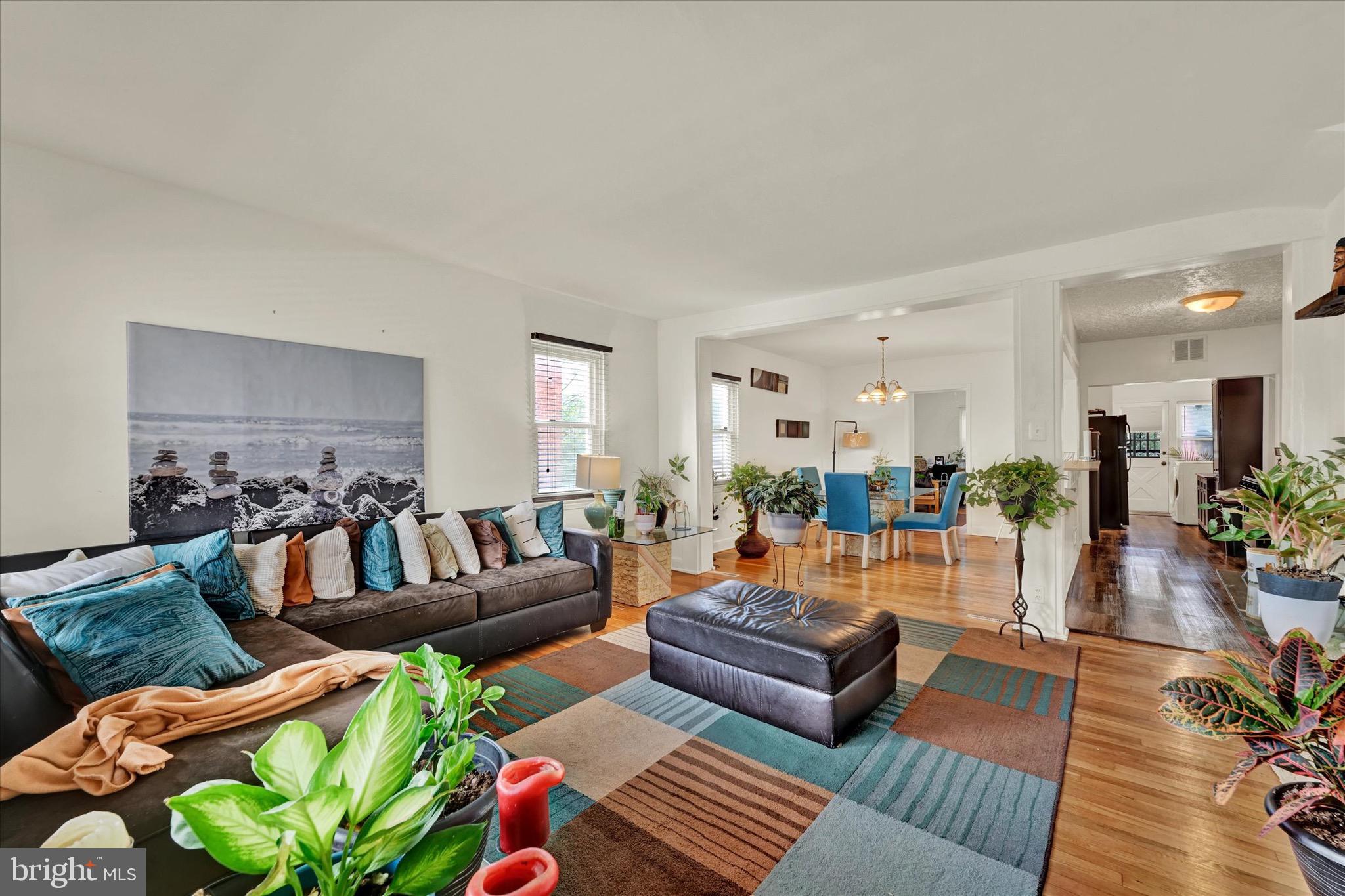 3922 Mortimer Avenue Baltimore, MD 21215 - Photo 5 of 27 a living room with furniture and a large window