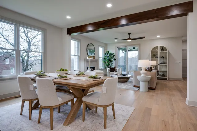 a bedroom with a bed and a potted plant