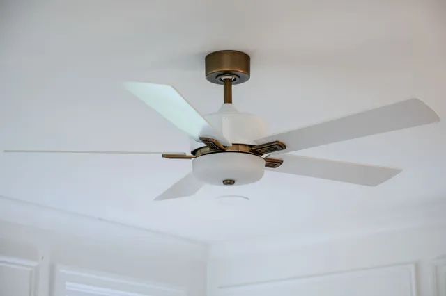 a view of a swimming pool with a yard