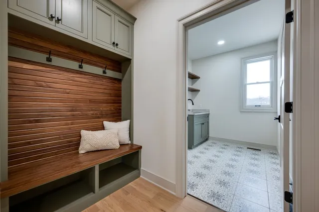 a view of a backyard with large trees