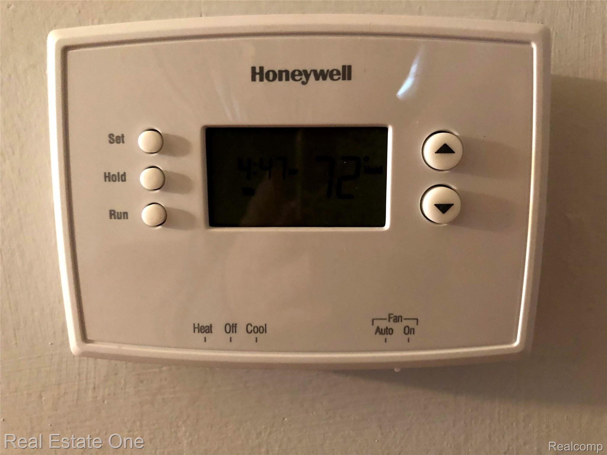 235 Millville Road Lapeer, MI 48446 - Photo 15 of 48 Honeywell electric, programable thermostat.