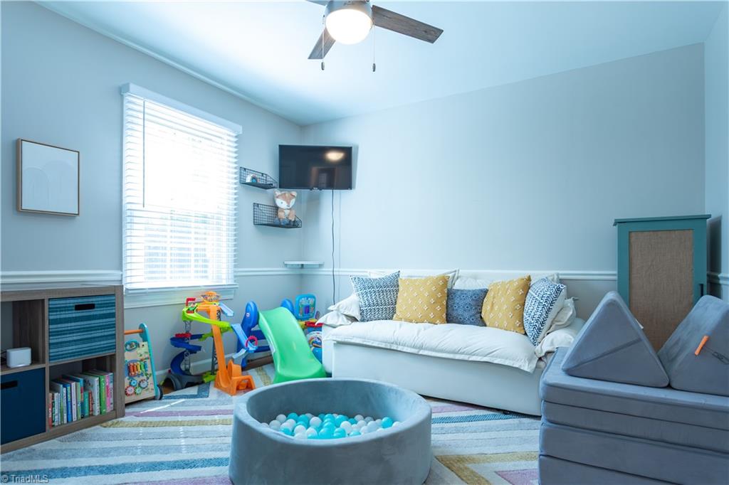 4200 Hobbs Road Greensboro, NC 27410 - Photo 22 of 36 Large MAIN LEVEL bedroom currently used as kids playroom. Also terrific for visiting parents, guests, etc.