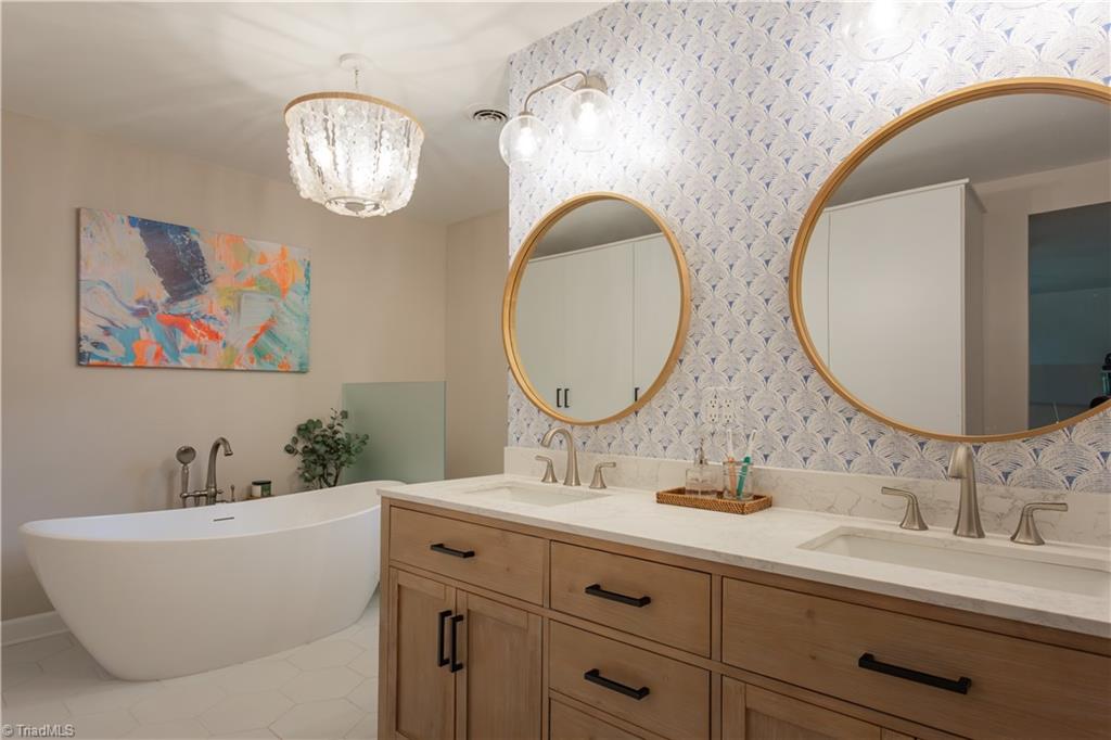 4200 Hobbs Road Greensboro, NC 27410 - Photo 25 of 36 GIANT primary bath with luxurious appointments.