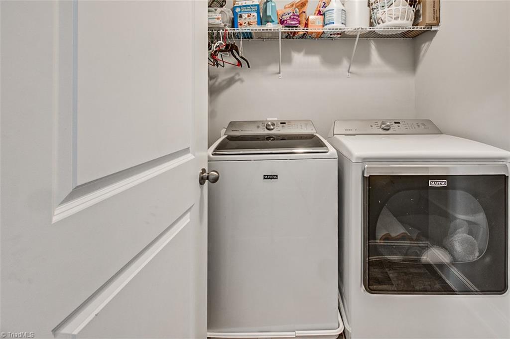 689 Nikyle Circle High Point, NC 27265 - Photo 23 of 33 Laundry room with shelving