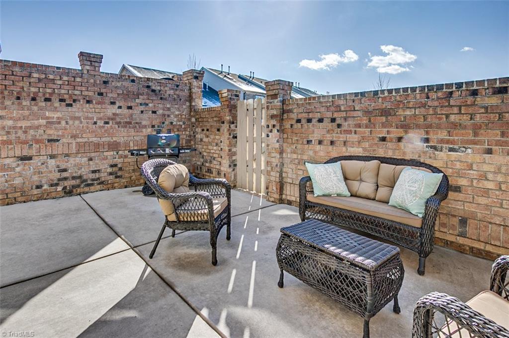 689 Nikyle Circle High Point, NC 27265 - Photo 25 of 33 Patio with privacy wall
