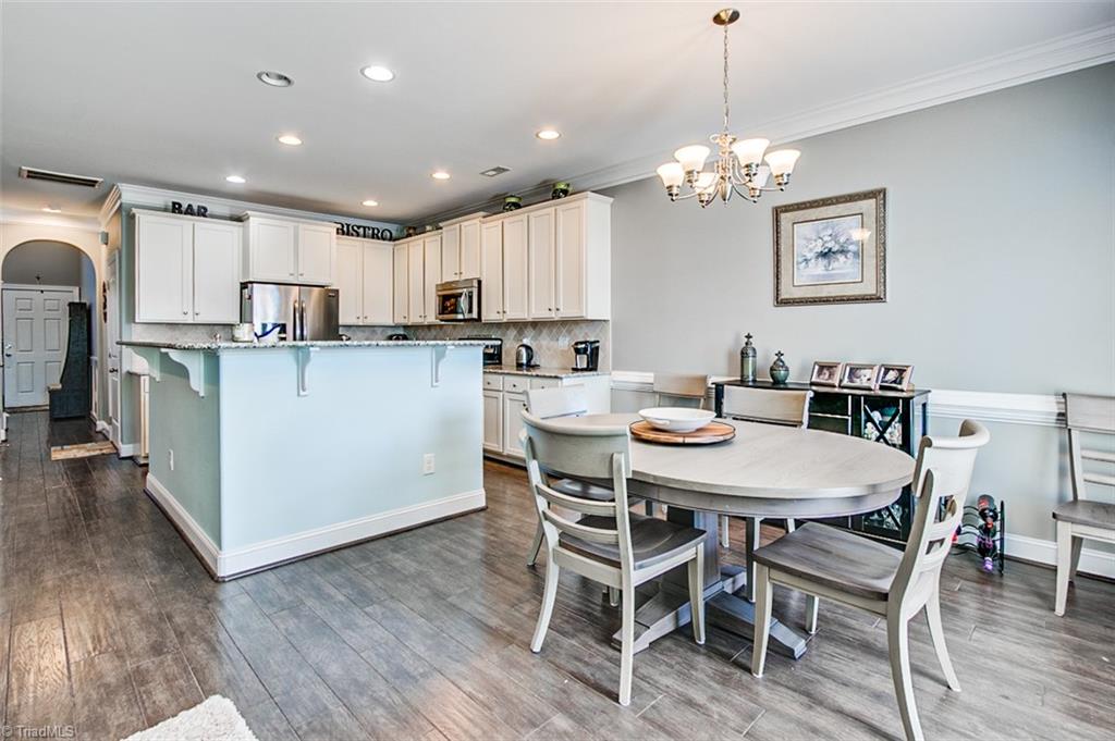 689 Nikyle Circle High Point, NC 27265 - Photo 8 of 33 Breakfast area, hardwoods