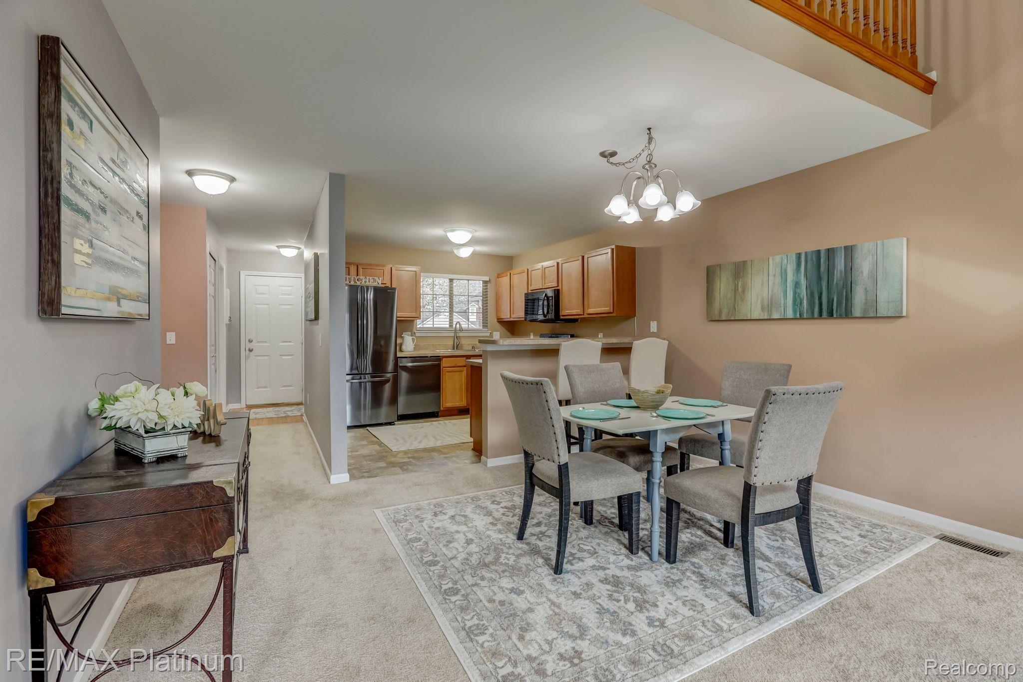 4689 Summer Ridge Drive Howell, MI 48843 - Photo 11 of 32 Dining space and kitchen.