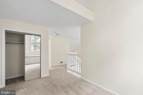 a bathroom with a tub sink double and mirror