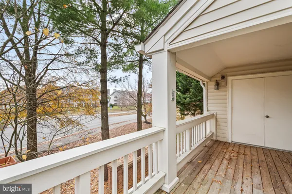 a view of empty room with a fireplace