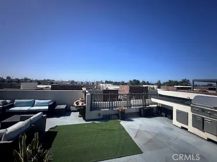 a view of a terrace with couches