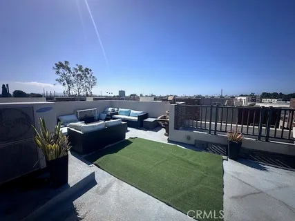 a view of a terrace with couches
