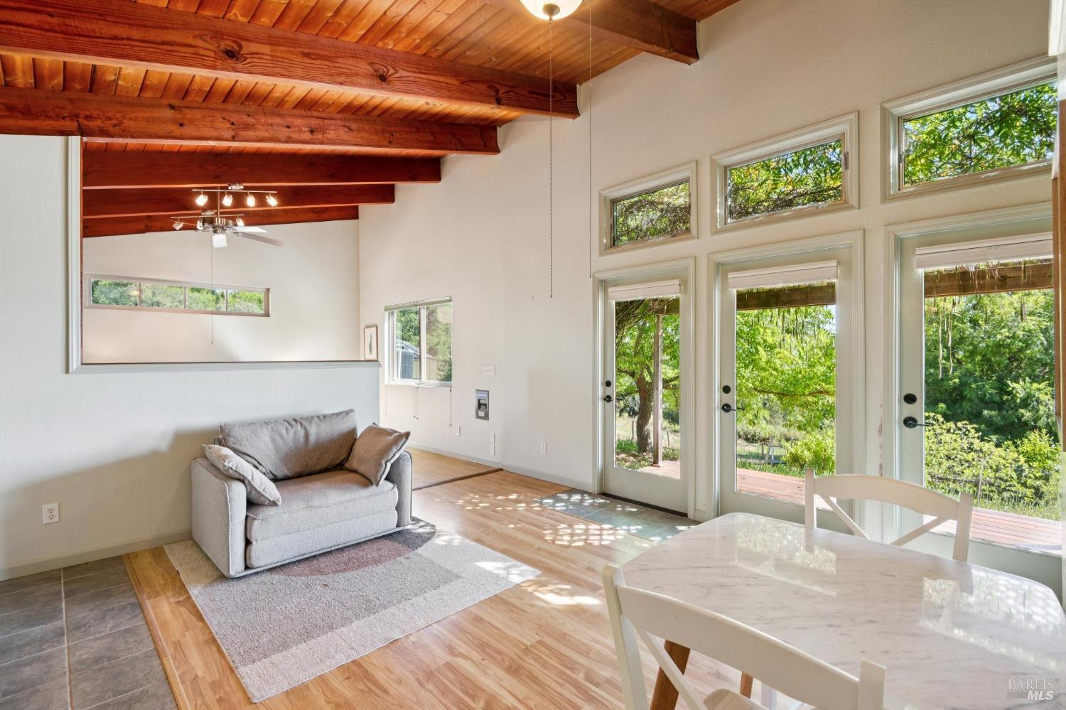 6960 Round Oak Road Penngrove, CA 94951 - Photo 49 of 58 a living room with furniture and a window