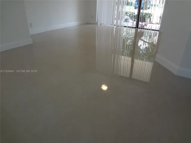 a view of a room with an empty space