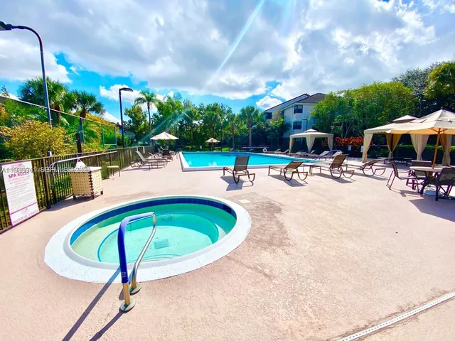a view of a tree in a yard