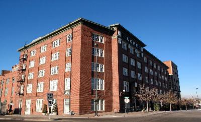 a view of a building with a street