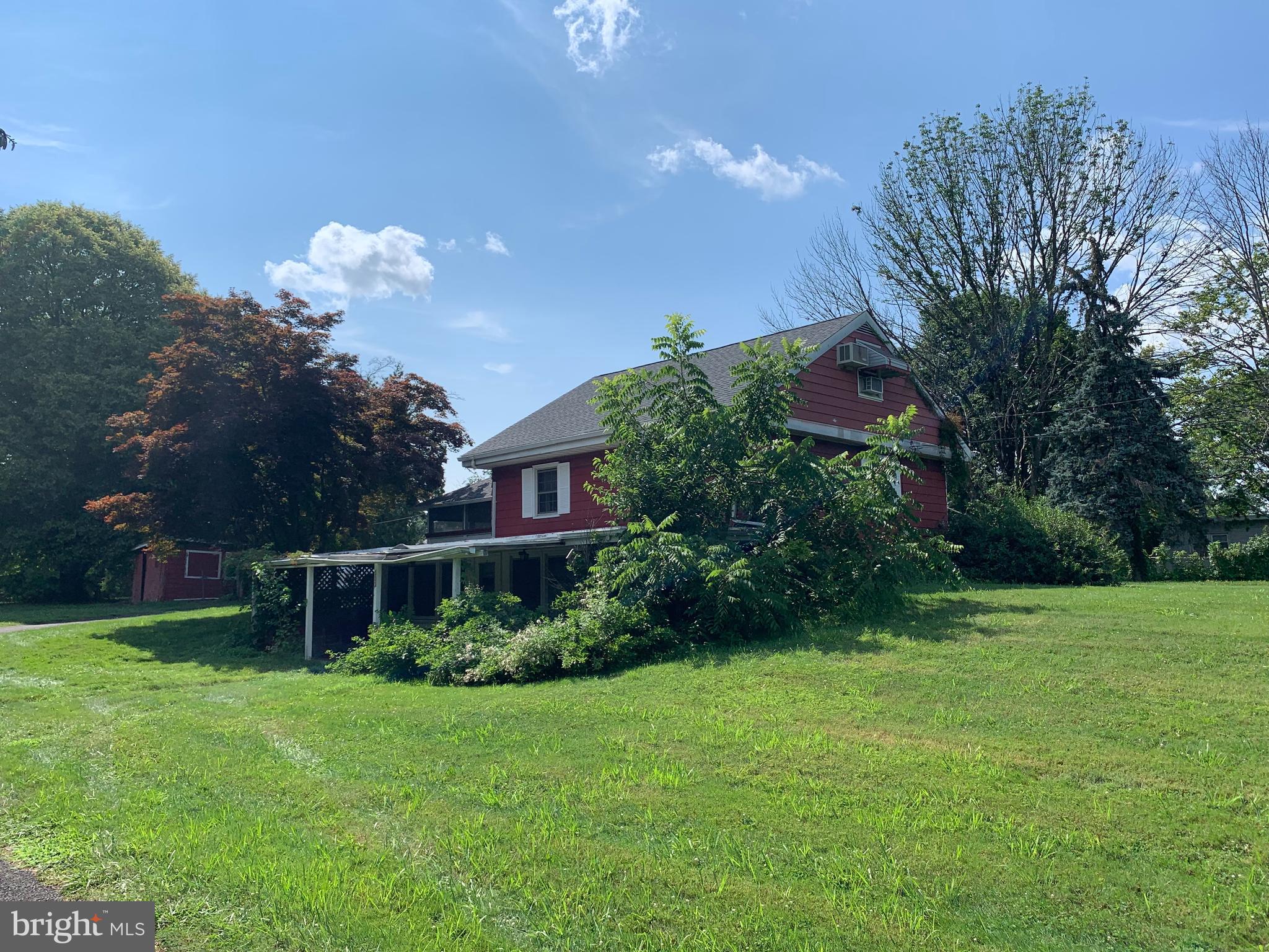 303 Meadowbrook Road Robbinsville, NJ 08691 - Photo 1 of 24 a front view of a house with a yard