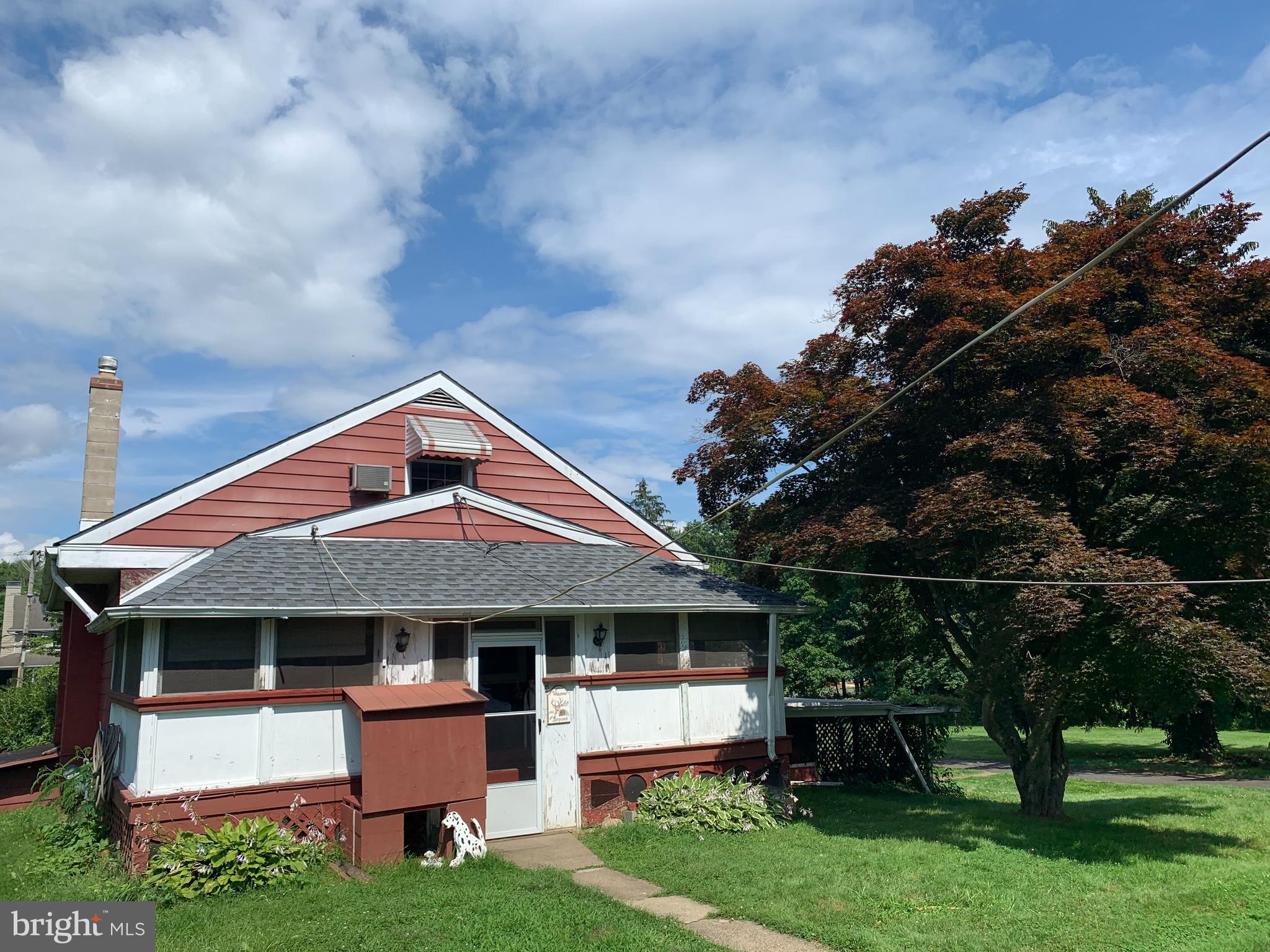 303 Meadowbrook Road Robbinsville, NJ 08691 - Photo 6 of 24 a front view of house with yard and trees in the background