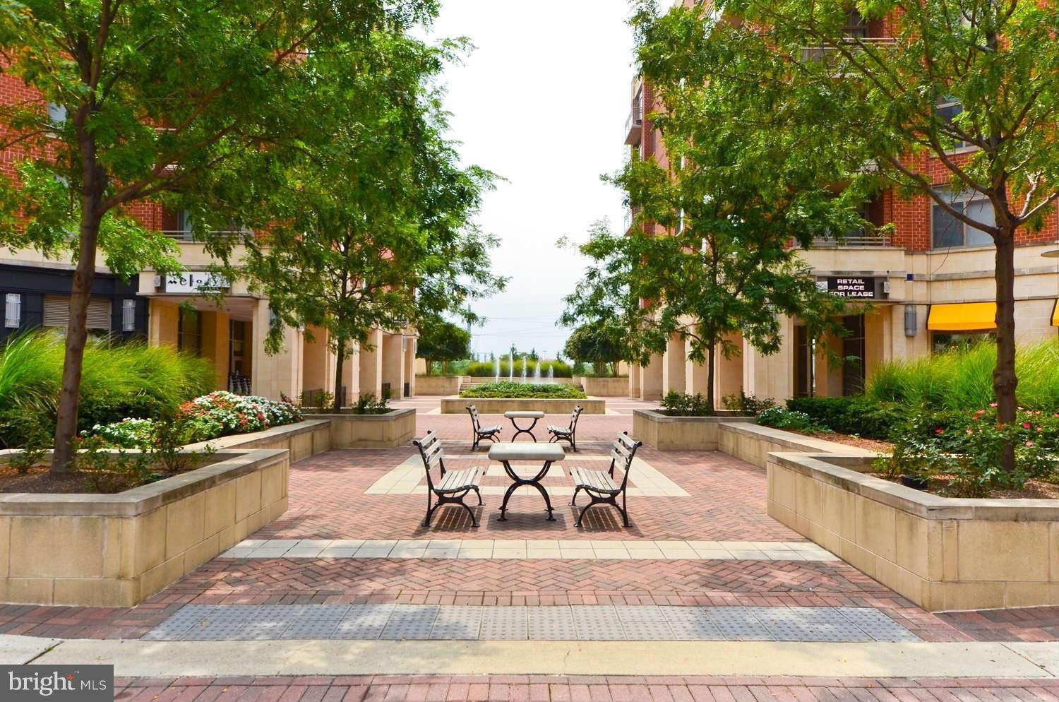 3650 South Glebe Road, Unit 349 Arlington, VA 22202 - Photo 14 of 21 a view of a chairs and table in the patio