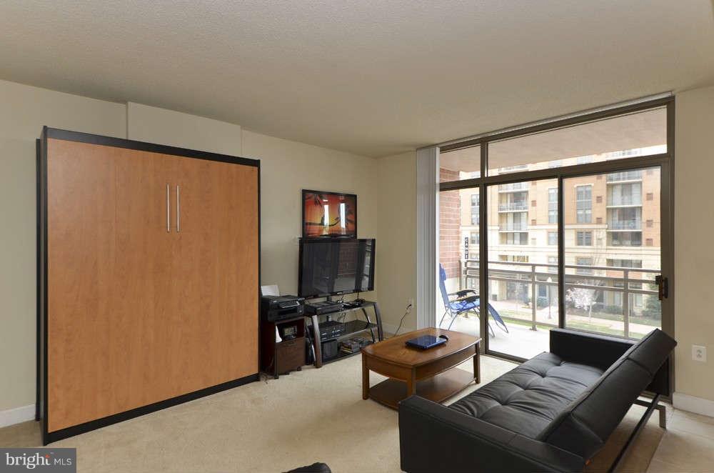 3650 South Glebe Road, Unit 349 Arlington, VA 22202 - Photo 6 of 21 a living room with furniture and a window
