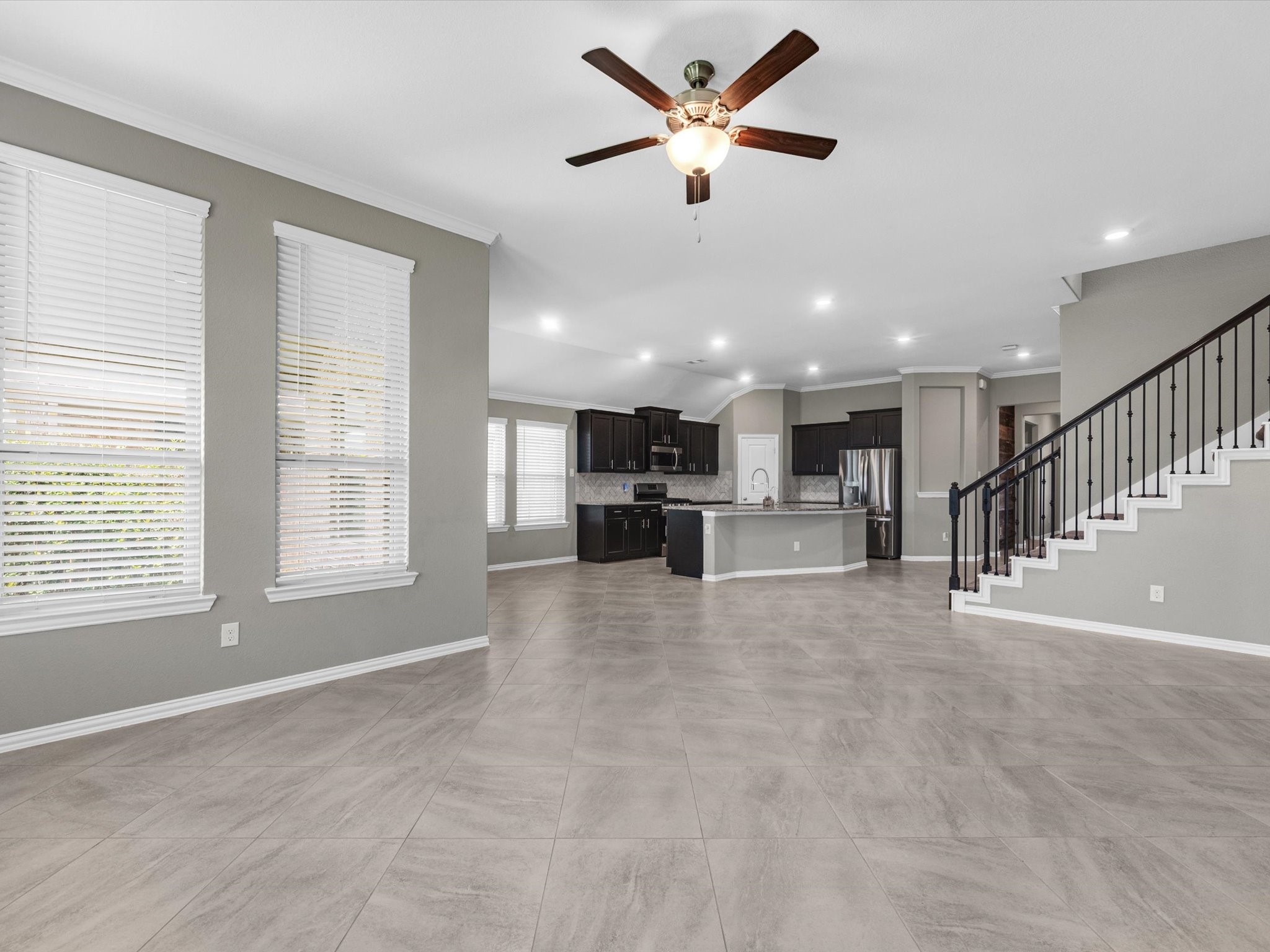 31120 Aspen Gate Trail Spring, TX 77386 - Photo 7 of 33 a view of an empty room with kitchen and window