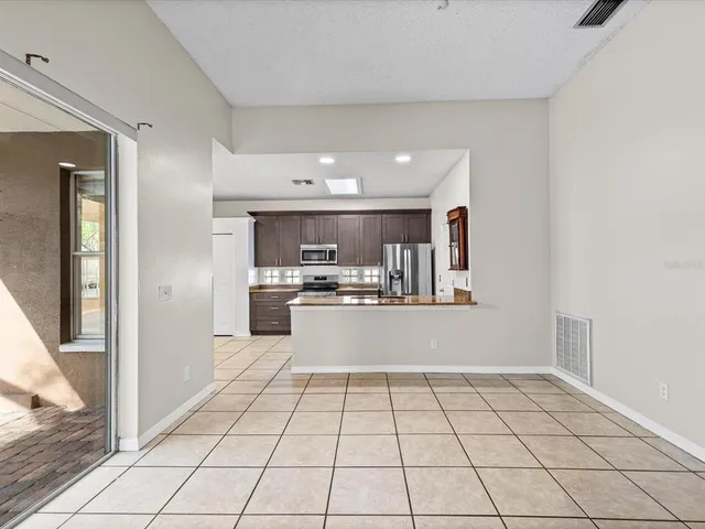 a view of kitchen with windows