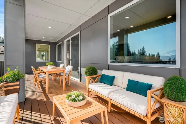 a outdoor living space with furniture and a potted plant