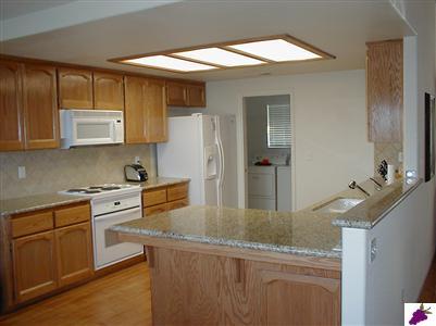 44252 Trabuco Road Coarsegold, CA 93614 - Photo 2 of 7 Granite counters in kitchen and laminate floors