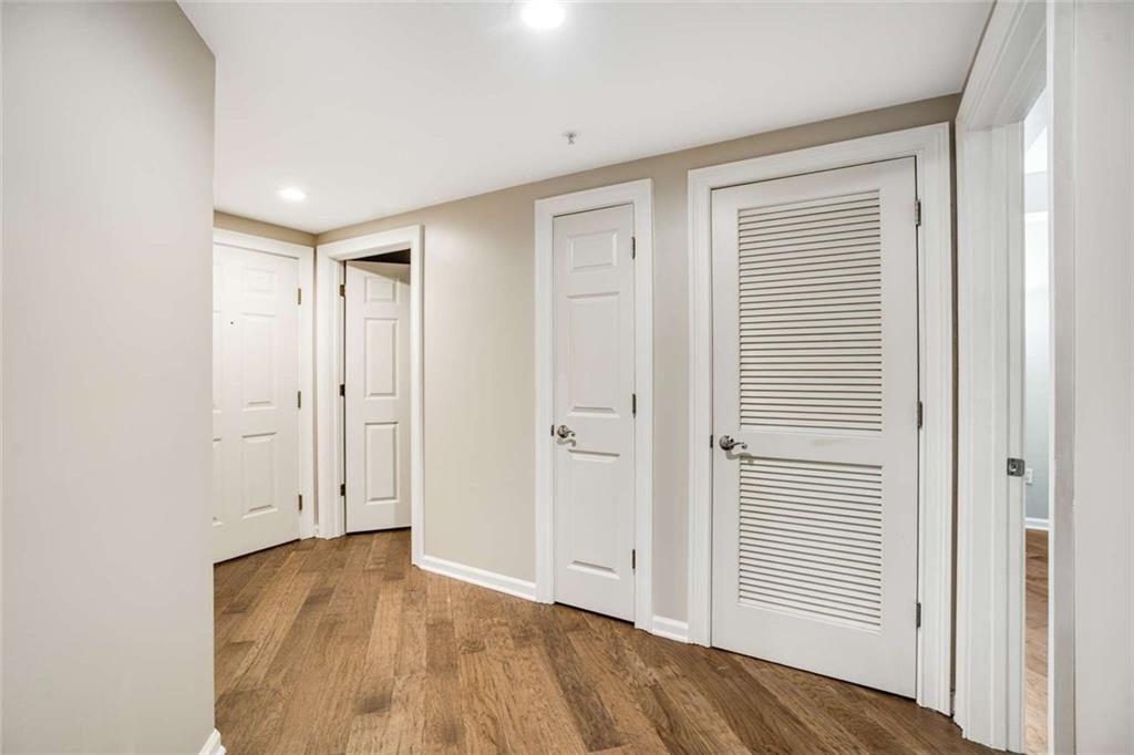 3275 Lenox Road Northeast, Unit 302 Atlanta, GA 30324 - Photo 19 of 50 a view of a livingroom with wooden floor