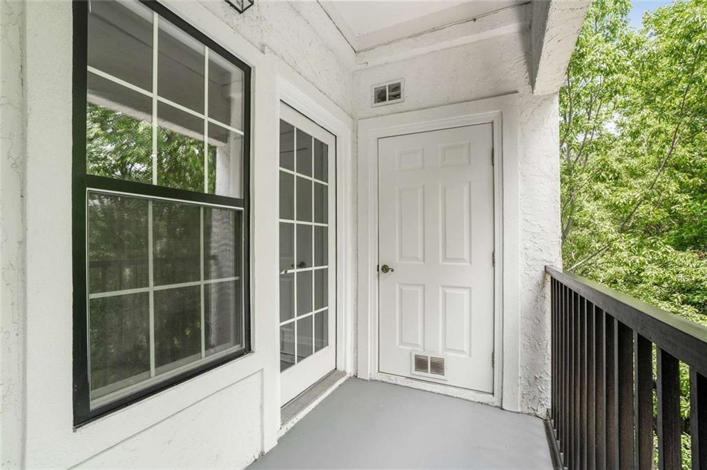 3275 Lenox Road Northeast, Unit 302 Atlanta, GA 30324 - Photo 32 of 50 a view of front door and porch