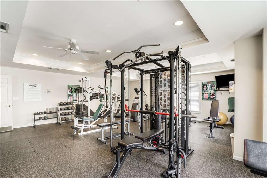 3275 Lenox Road Northeast, Unit 302 Atlanta, GA 30324 - Photo 40 of 50 a view of a room with gym equipment