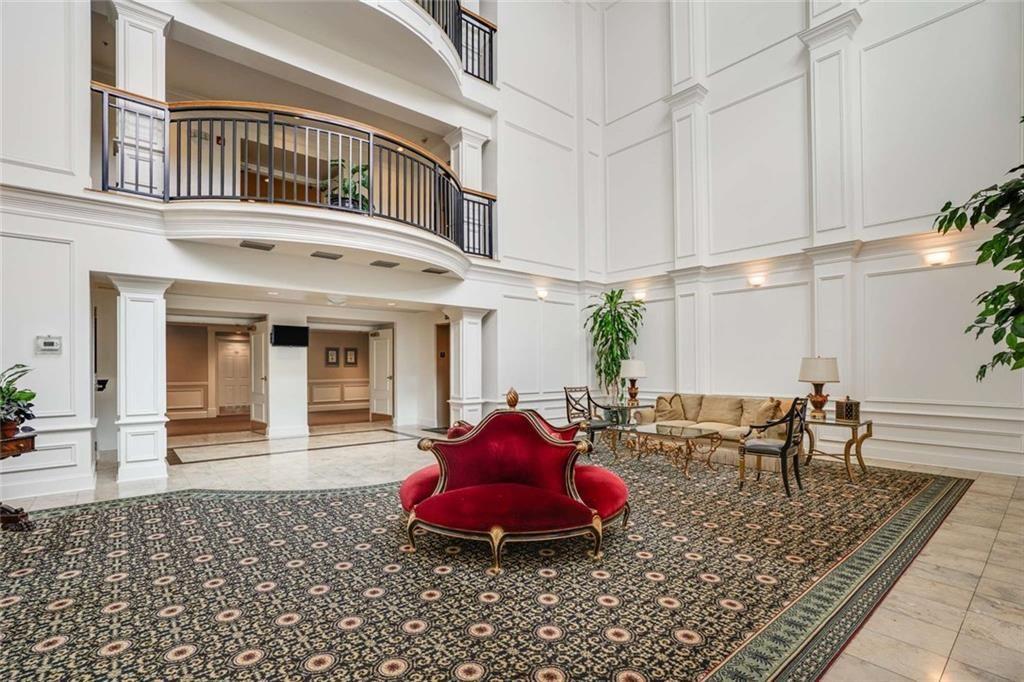 3275 Lenox Road Northeast, Unit 302 Atlanta, GA 30324 - Photo 4 of 50 a view of a livingroom with furniture an entryway