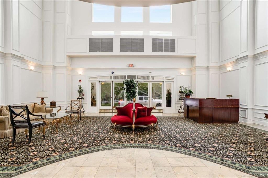 3275 Lenox Road Northeast, Unit 302 Atlanta, GA 30324 - Photo 5 of 50 a living room with furniture