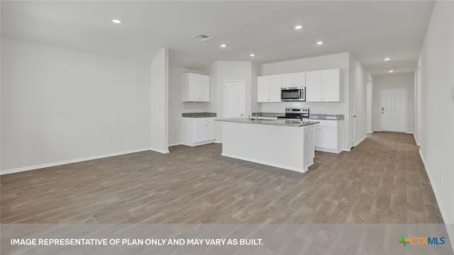 a view of room with a sink and mirror