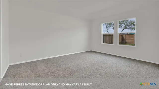a bathroom with a double vanity sink and mirror
