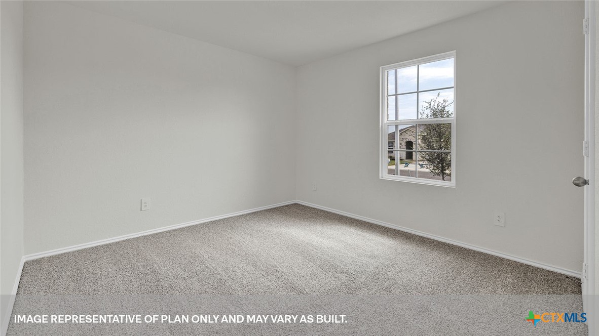418 Hodges Street Maxwell, TX 78656 - Photo 5 of 32 an empty room with windows